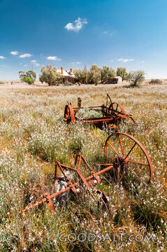 Abandoned rusty farm machinery.