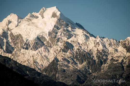 Alpine detail of the snow, ice, rocks  and shapes of massive mountains.