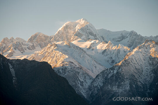 Alpine detail of the snow, ice, rocks  and shapes of massive mountains.