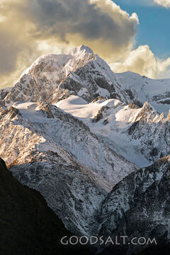 Alpine detail of the snow, ice, rocks  and shapes of massive mountains.