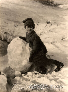 Boy Rolling Snow Ball