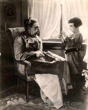 Child Helping Grandmother