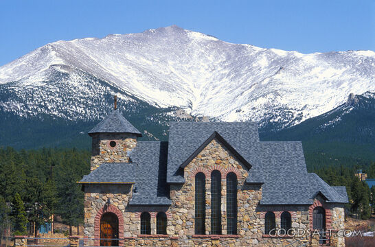 Church With Snowy Mountain Backdrop