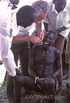 Dr. Ted Flaiz Giving Dental Service