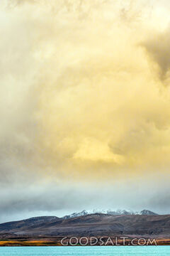 eavy sky hovering above distant shore.