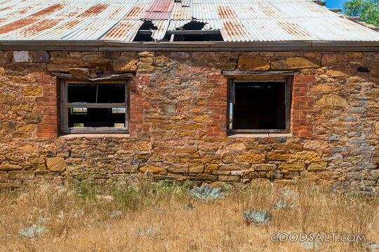 External window in stone house wall.