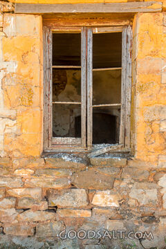 External window in stone house wall.