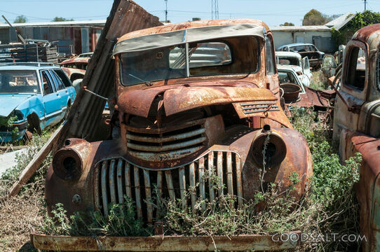 Front of rusty Chevrolet truck.