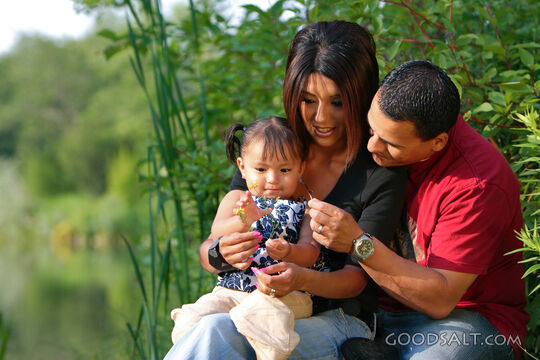Happy family in park.