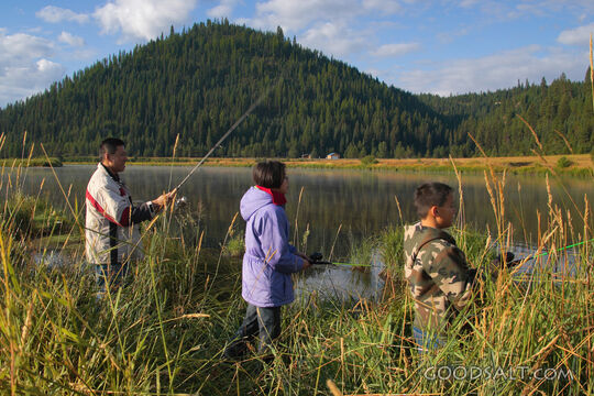 IDAHO. Smith’s Ferry. Man and kids fishing on autumn morning