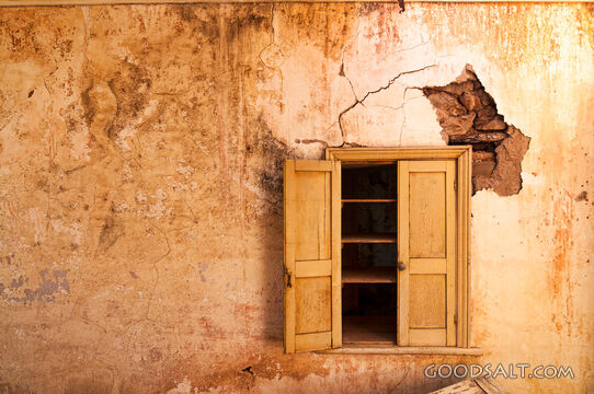 Interior wall inside abandoned farmhouse.
