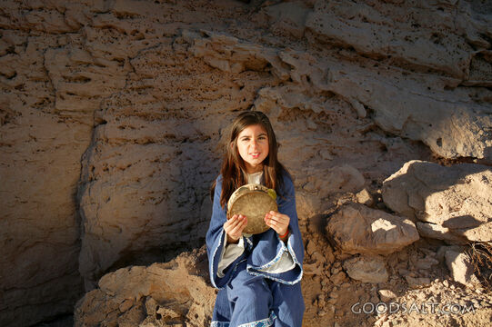 Isrealite Girl in Desert With Tamborine