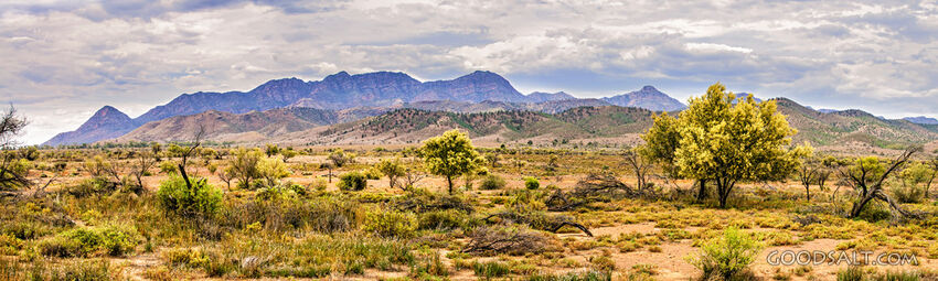 large areas of blue and yellow features in this distant outback scene