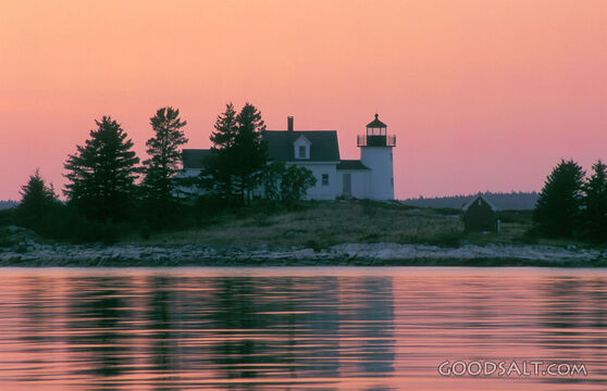Lighthouse at Sunset on the Water