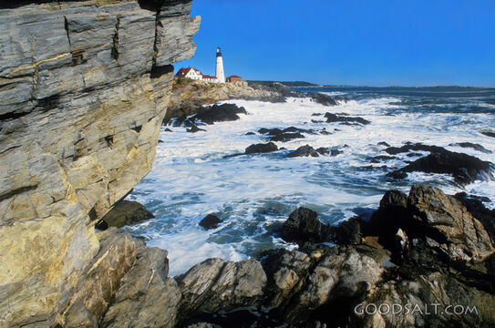 Lighthouse at the Ocean With Huge Rocks