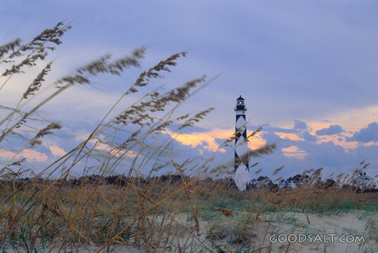 Lighthouse on the Beach at Sunset