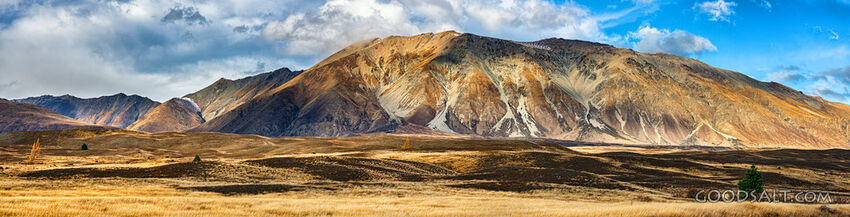 Low hills exhibit great variety of colour.