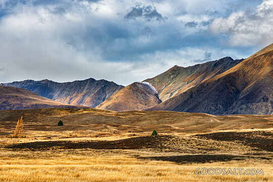 Low hills exhibit great variety of colour.