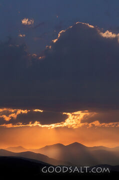 Orange Sunset With Clouds and Mountains