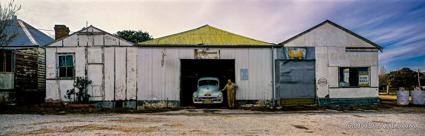 proud owner outside country car mechanics