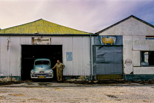 proud owner outside country car mechanics