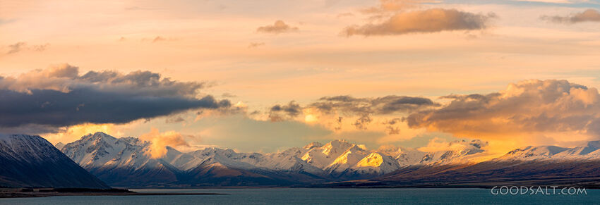 Spectacular sunset clouds and golden lit peaks.