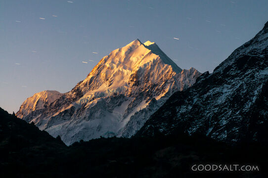 Tall mountain peak covered in snow.