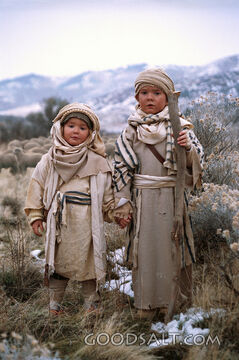 Two Small Bedouin Children Holding Hands