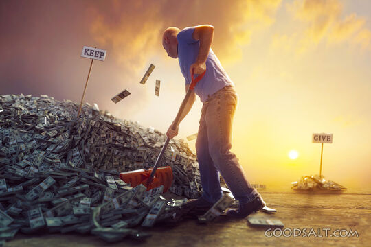 A man shoveling large pile of money.