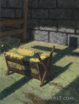 A Shadow of the Cross Laying Across a Manger