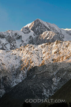Alpine detail of the snow, ice, rocks  and shapes of massive mountains.
