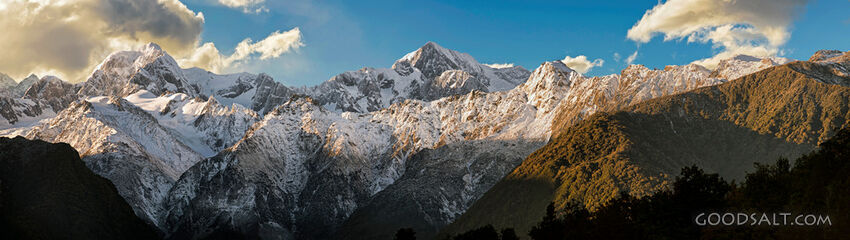 Alpine detail of the snow, ice, rocks  and shapes of massive mountains.