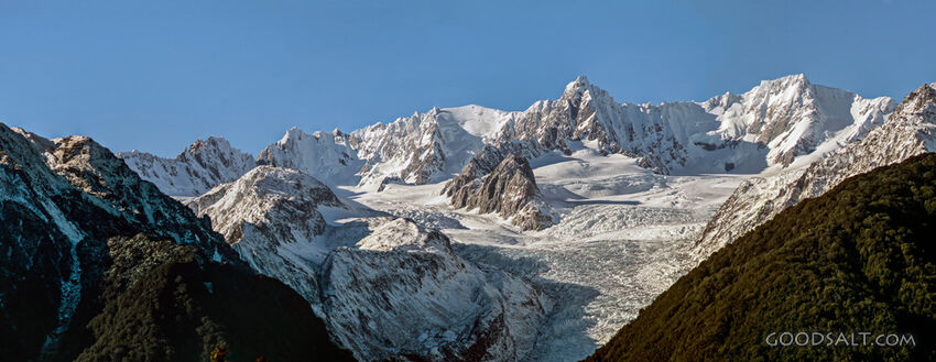Alpine detail of the snow, ice, rocks  and shapes of massive mountains.