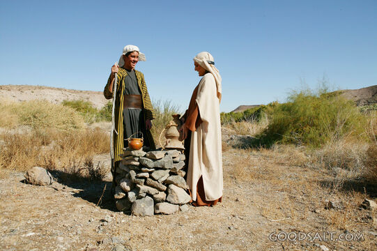 Travelers at the Desert Well
