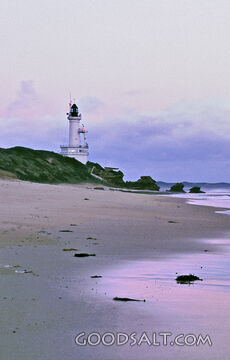 Beach With Lighthouse