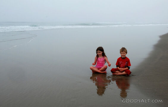 Children Sitting on the Beach