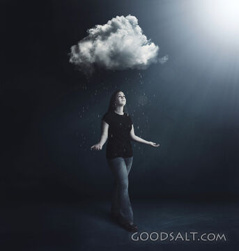 Cloud Raining on Woman