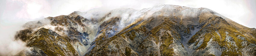 detail of cloud-engulfed snowy mountainside.
