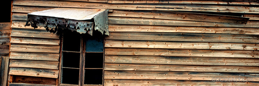 Detail of wooden shop's side wall.