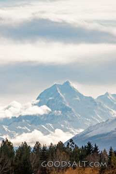 early morning sky over huge snow-clad peak