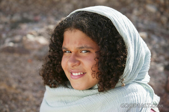Smiling Child in Biblical Garments