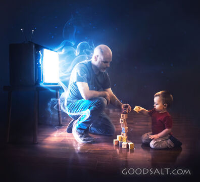 Father and son playing blocks