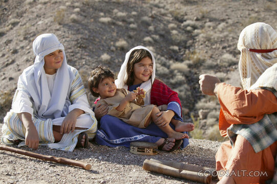 Father Teaching Children in the Wilderness
