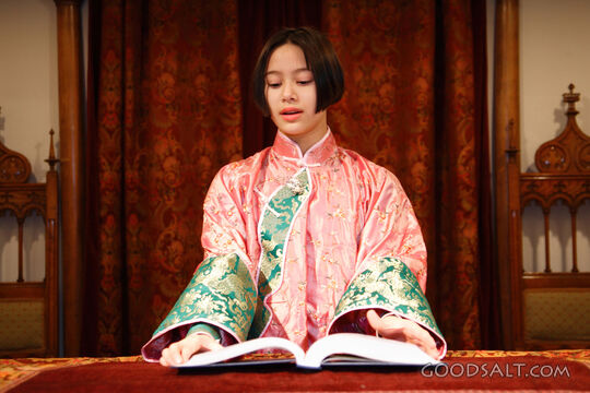 IDAHO. Boise. Asian Jewish girl standing at bimah in synagog