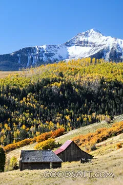 Autumn Homestead Beneath the Snowy Mountain