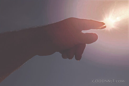 Hand Reaching Toward Divine Light