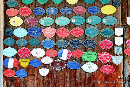 French Agricultural Award Plaques on Wooden Door