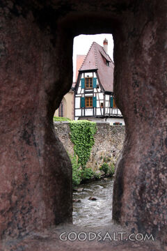 Village House Through the Stone Passage