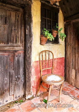 Quiet Chair by the Old Doorway