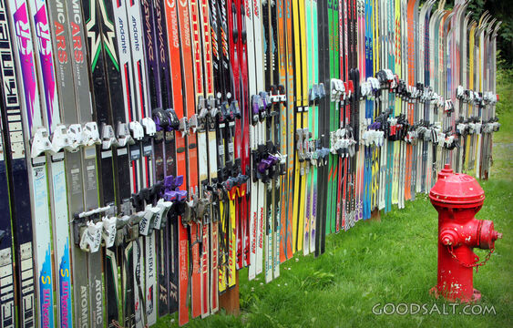 Ski Fence Beside a Fire Hydrant